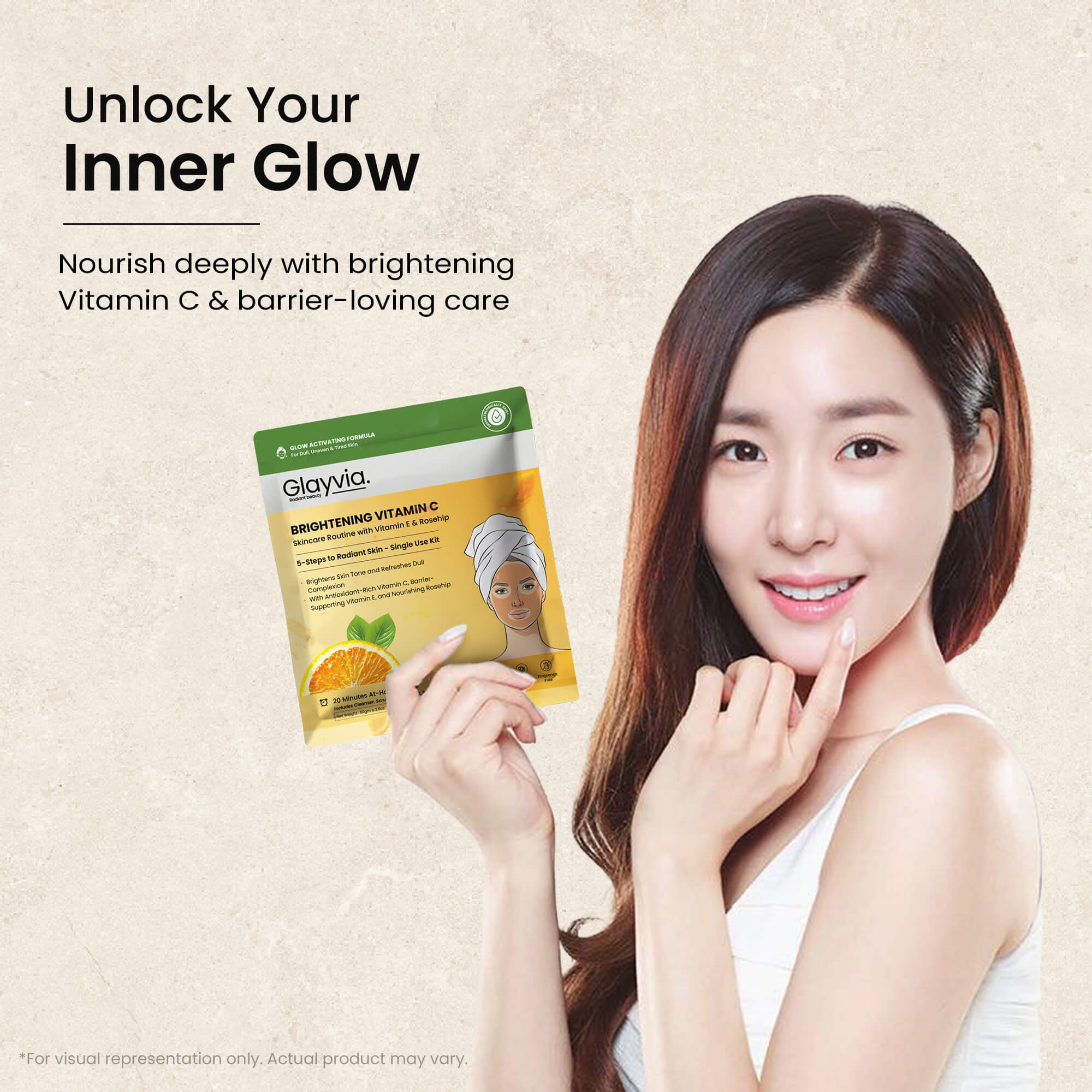 Woman holding a Glavya brightening vitamin C product with text &