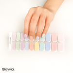 Hand wearing Glayvia NG200023 pastel mix semi cured gel nail wraps displayed above matching pastel nail wrap sticker sheet