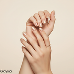 Studio beauty shot of Glayvia NG200026 champagne gold glitter semi cured gel nail wraps with elegant gold sparkle manicure