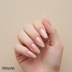 Macro closeup of Glayvia NG200092 peach iridescent glitter semi cured gel nail wraps showing peach shimmer manicure with holographic sparkle