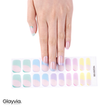 Hand wearing Glayvia NG200188 pastel French semi cured gel nail wraps displayed above matching pastel gel nail wrap sticker sheet
