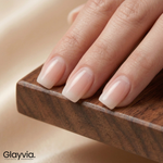 Macro closeup of Glayvia NG200289 sheer milky semi cured gel nail wraps showing natural glossy nude manicure