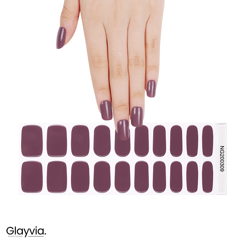 Hand wearing Glayvia NG200309 muted mauve gloss semi cured gel nail wraps displayed above matching mauve tone nail wrap sticker sheet