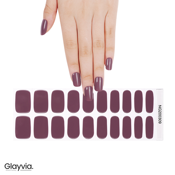 Hand wearing Glayvia NG200309 muted mauve gloss semi cured gel nail wraps displayed above matching mauve tone nail wrap sticker sheet