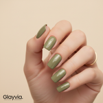 Close-up of hand wearing Glayvia olive green semi-cured gel nail wraps with glossy finish (NG200028)