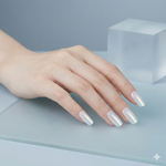 Silky Pearls chrome pearl semi cured gel nails with soft milky base in a minimal studio setting.